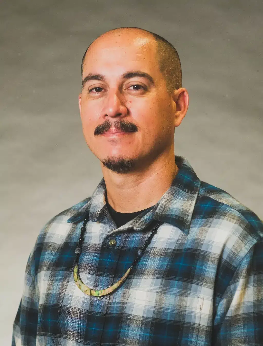 a headshot of Arthur Argomaniz