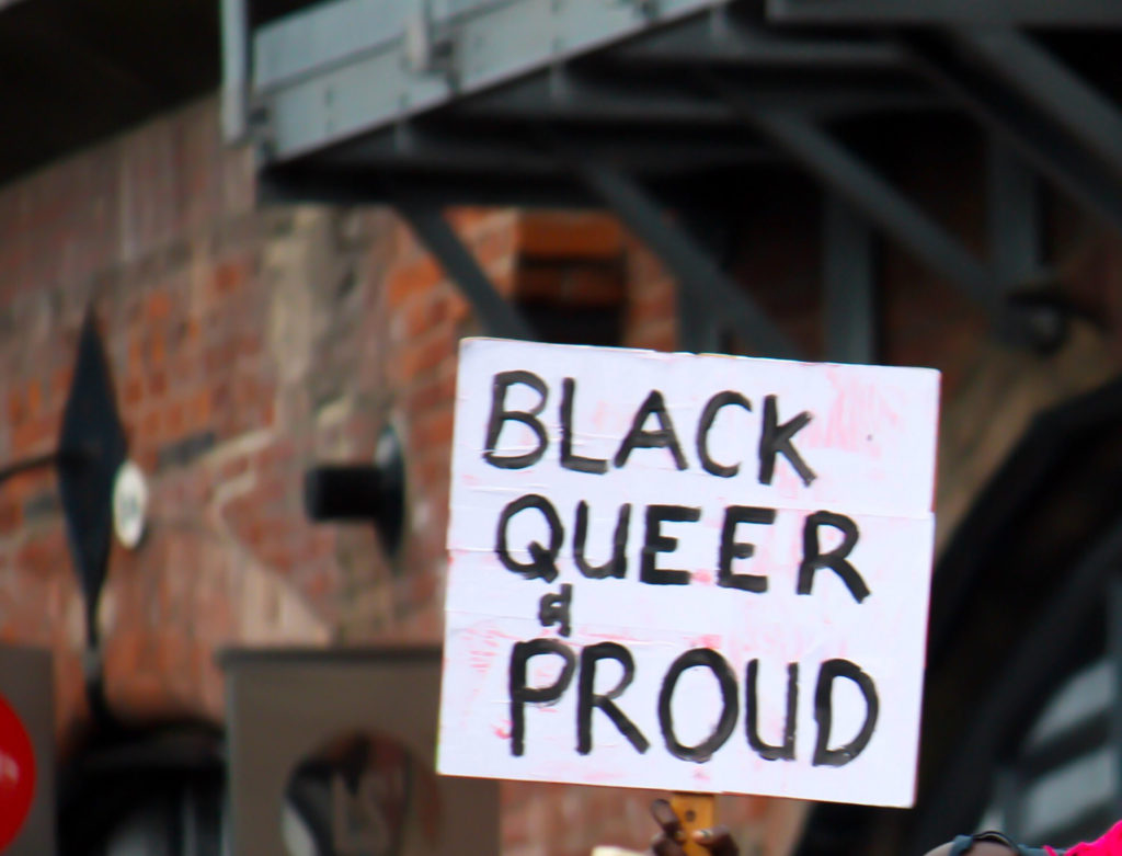 Sign reading "Black, Queer, and Proud."