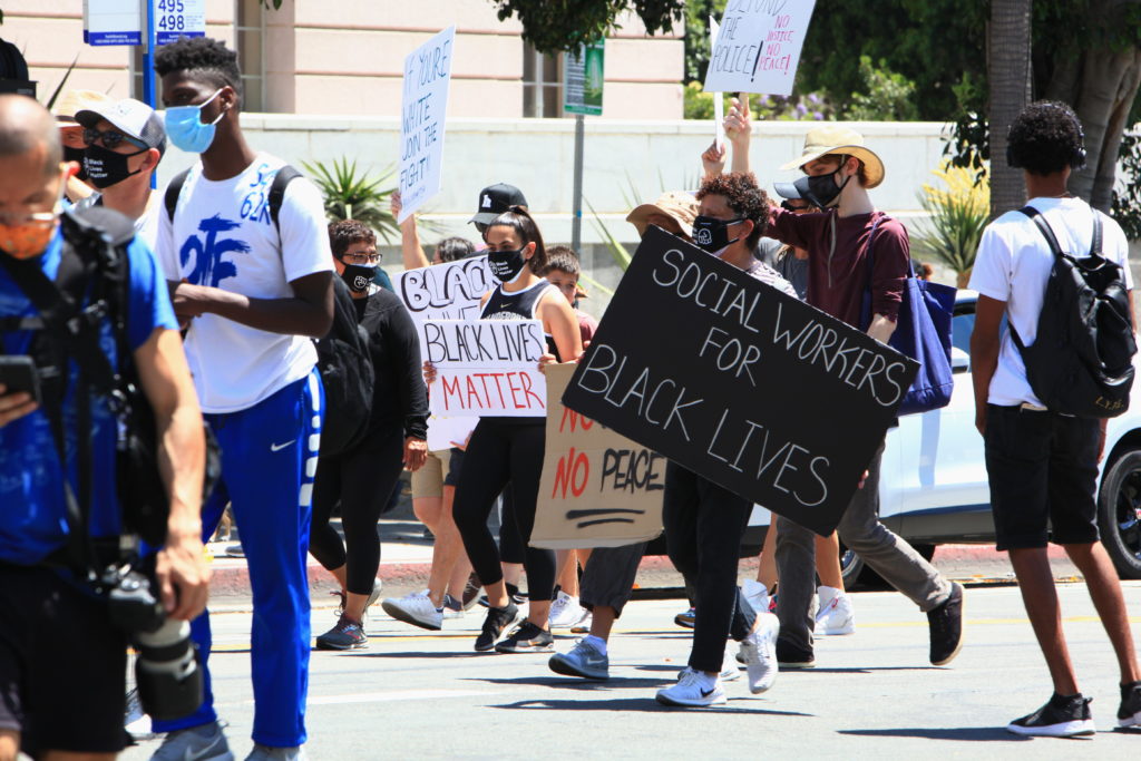 Citizens marching at a Black Lives Matter rally.