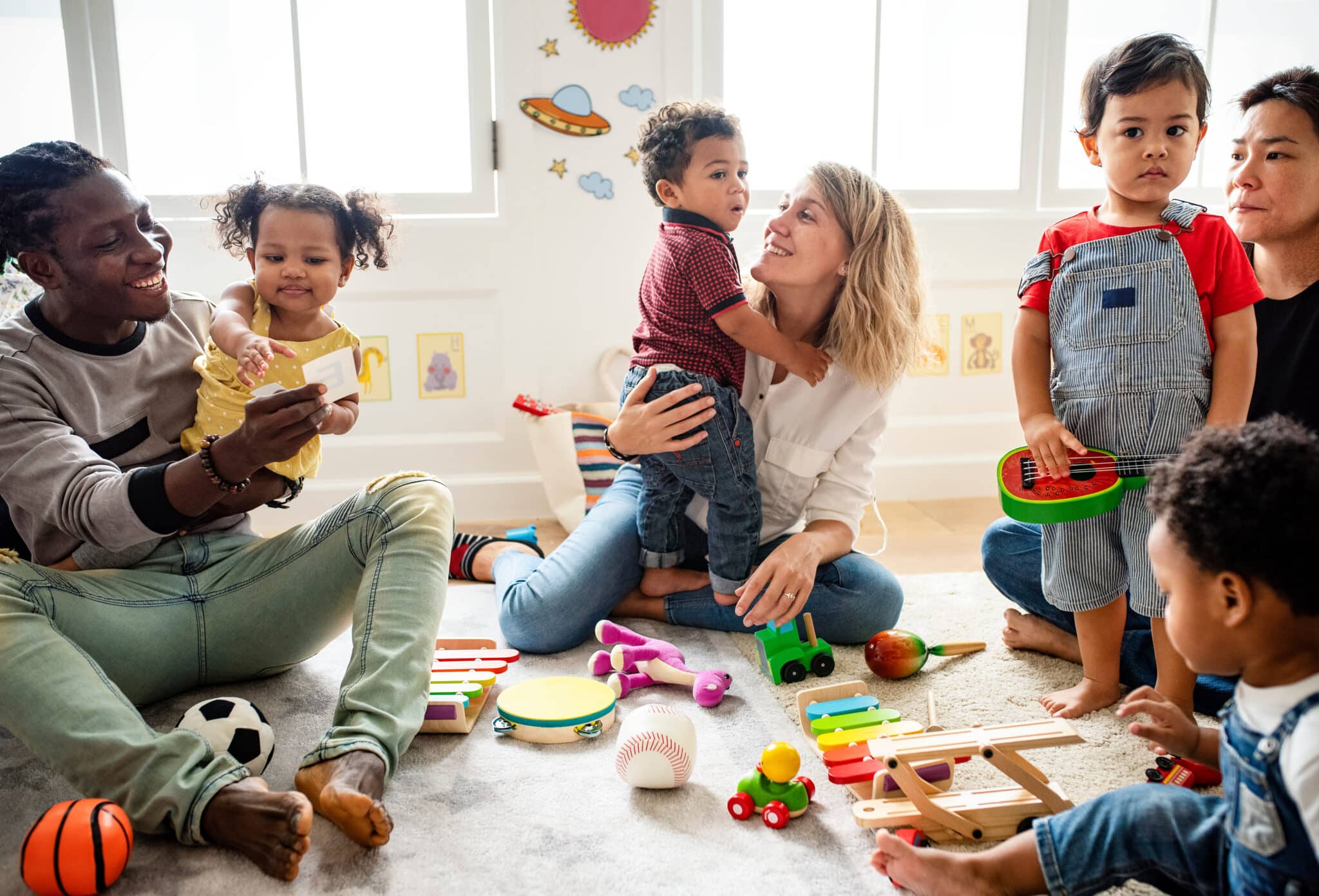 Diverse children enjoying playing with toys Diverse children enjoying playing with toys