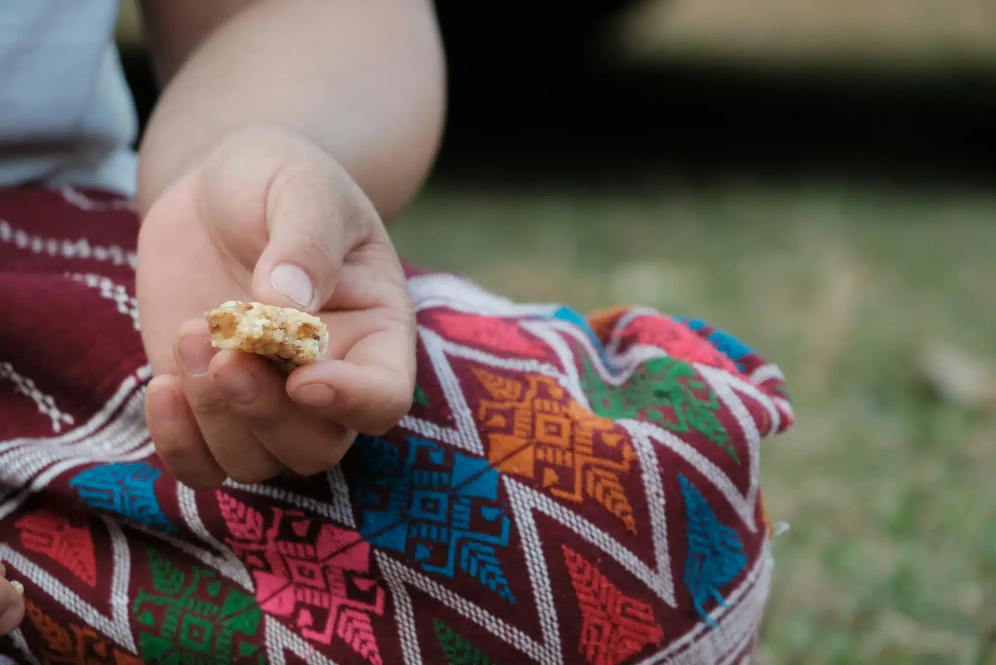 a photo of a person holding food