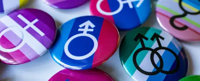 a pile of pins representing different genders